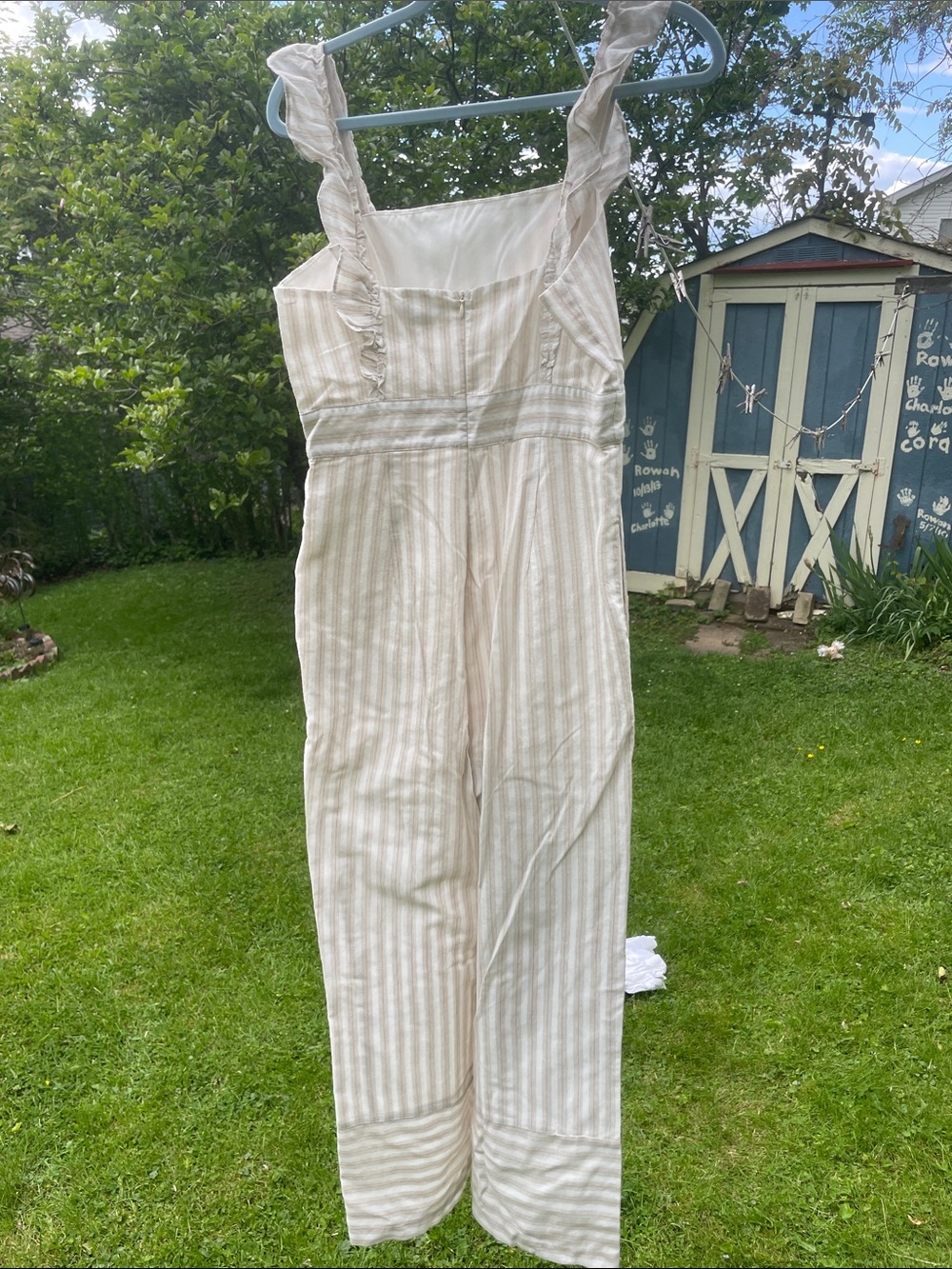 Striped Cream Ruffle-Shoulder Jumpsuit - Picture 5 of 7